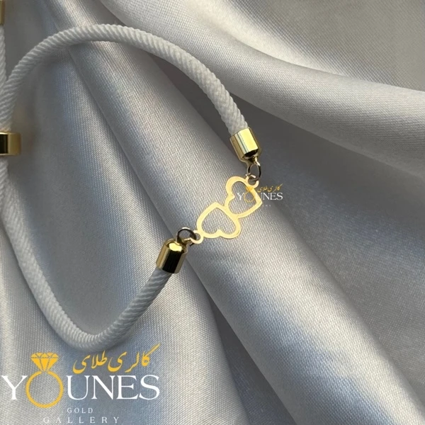 دستبند دو قلب توخالی طلا لیزری